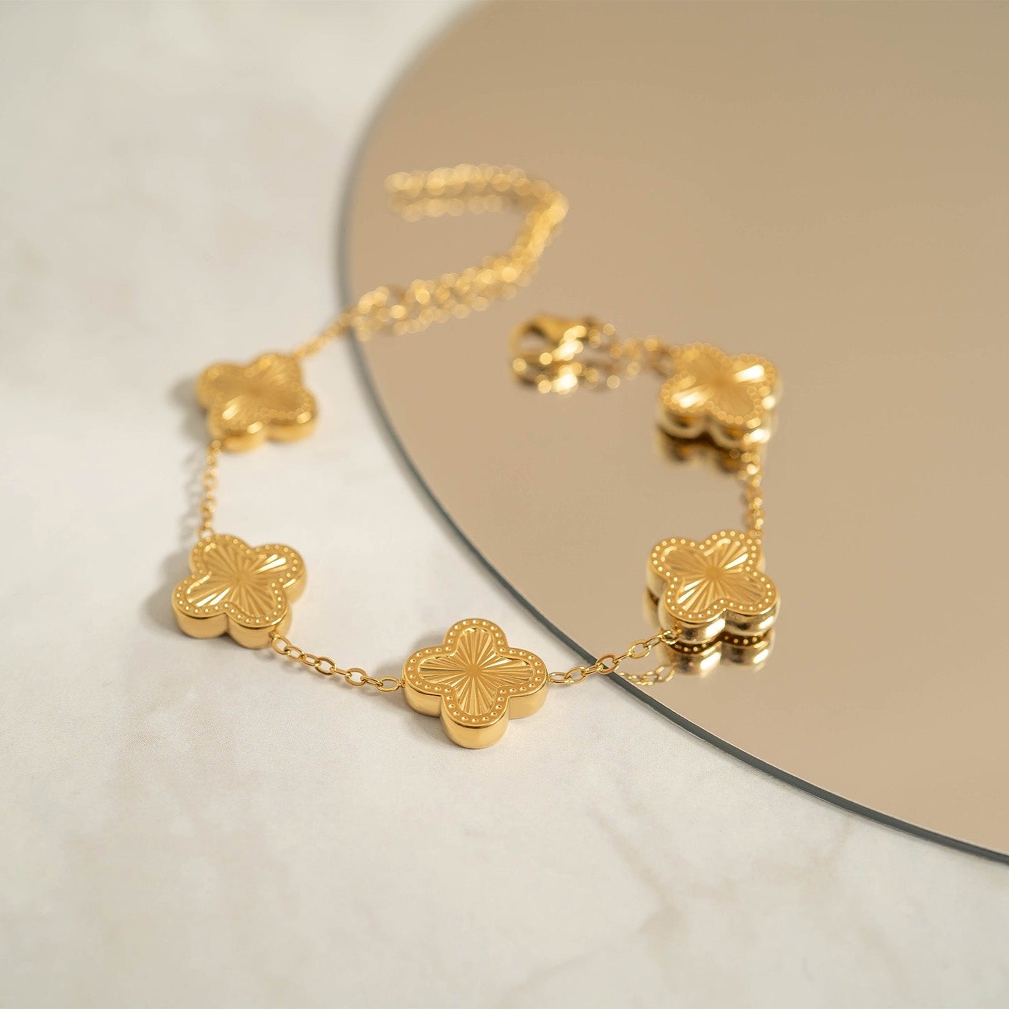 18K Gold PVD Coated Stainless Steel Sunburst Clover Charm Bracelet